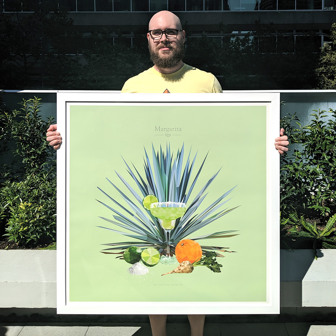 Framed Margarita print held outdoors